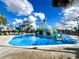 Community water park, featuring various slides and play areas, perfect for Gathering fun and recreation at 9122 Sommerset Hills Dr, Davenport, FL 33896