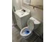 Freshly renovated bathroom with a new toilet, vanity, and decorative accents creating a modern space at 100 Avenue K Ne, Winter Haven, FL 33881