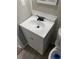 Bathroom featuring a new vanity and sink, complemented by updated fixtures and design at 100 Avenue K Ne, Winter Haven, FL 33881