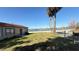 This property has a well-maintained one-story home with water views across the street at 100 Avenue K Ne, Winter Haven, FL 33881