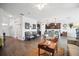 Spacious living room with wood floors and neutral decor at 1107 Trappers Trail Loop, Davenport, FL 33896