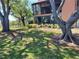 A view of the backyard showing mature trees providing plenty of shade at 133 La Casa # 133, Lake Wales, FL 33898