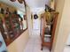 Bright hallway features tiled flooring and charming decor, creating a warm and inviting entrance at 133 La Casa # 133, Lake Wales, FL 33898