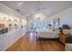 Spacious main bedroom features hardwood floors, high ceilings, a ceiling fan and walk out patio at 1444 Pelican Bay Trl, Winter Park, FL 32792
