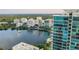 Panoramic view of a building with lake view with its exterior highlighted by lush greenery and natural light at 150 E Robinson St # 219, Orlando, FL 32801
