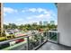 Balcony view showcasing the city skyline, street views, and lush greenery at 150 E Robinson St # 219, Orlando, FL 32801