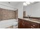 Bathroom with tiled shower-over-tub, single sink vanity and modern fixtures at 150 E Robinson St # 219, Orlando, FL 32801