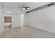 Bedroom with ceiling fan and en suite bathroom with tub at 150 E Robinson St # 219, Orlando, FL 32801