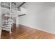 Large open living space with spiral staircase at 150 E Robinson St # 219, Orlando, FL 32801