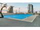 Modern rooftop basketball court providing an active recreational space with stunning city skyline views at 150 E Robinson St # 219, Orlando, FL 32801