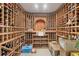 Custom wine cellar with wooden racks, providing ample storage and an elegant space for wine connoisseurs at 150 E Robinson St # 219, Orlando, FL 32801