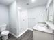 Modern bathroom with a stand-up shower, double vanity, granite counters, and contemporary fixtures at 1706 3Rd Ave, Deland, FL 32724