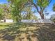 Fenced backyard featuring mature trees and ample open space at 1921 Taylor Ave, Winter Park, FL 32792