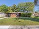 Charming single-story home with a well-maintained lawn and mature trees in a desirable neighborhood at 1921 Taylor Ave, Winter Park, FL 32792