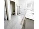 Well-lit bathroom showcasing a double sink vanity, toilet room, and neutral tones at 1943 Fountains Dr, Kissimmee, FL 34744
