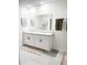 Bright bathroom with a double sink vanity, neutral tones, and ample counter space at 1943 Fountains Dr, Kissimmee, FL 34744