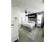 Stylish main bedroom with elegant decor, plush carpet, and plenty of natural light at 1943 Fountains Dr, Kissimmee, FL 34744