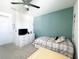 Comfortable bedroom with a twin bed, a ceiling fan, and a spacious closet at 1943 Fountains Dr, Kissimmee, FL 34744
