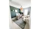 Stylish home office with decorative wall paneling, modern furnishings, and bright natural light at 1943 Fountains Dr, Kissimmee, FL 34744