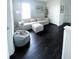 Cozy loft features a comfortable seating area with a neutral color palette at 1943 Fountains Dr, Kissimmee, FL 34744