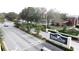 Southern Dunes Golf and Country Club entrance with signage, landscaping, and street view at 2316 Paulette Dr, Haines City, FL 33844