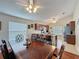 Open-concept dining room with a view of the kitchen, perfect for entertaining and Gathering gatherings at 2316 Paulette Dr, Haines City, FL 33844