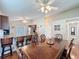 Open-concept dining room adjacent to the kitchen, perfect for Gathering meals and entertaining guests at 2316 Paulette Dr, Haines City, FL 33844