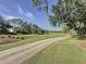 Beautiful golf course view with lush greenery and well-maintained grounds at 2316 Paulette Dr, Haines City, FL 33844