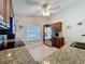 Bright kitchen with stainless steel appliances, granite countertops, and tiled floors for a modern feel at 2316 Paulette Dr, Haines City, FL 33844