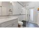 Sleek bathroom with frameless glass shower, white vanity, and modern fixtures at 2515 Ridgewind Way, Windermere, FL 34786