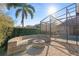 A cozy outdoor fire pit area with stone seating is perfect for entertaining and enjoying cool evenings at 2515 Ridgewind Way, Windermere, FL 34786