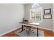 Bright office space with hardwood floors, natural light, and a modern desk setup at 2515 Ridgewind Way, Windermere, FL 34786