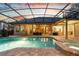 Enclosed pool and spa, offering a tranquil retreat with an outdoor living space at 2515 Ridgewind Way, Windermere, FL 34786
