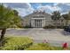 Community clubhouse featuring well-kept landscaping and a convenient parking area at 2604 Lodi Cir # 103, Kissimmee, FL 34746