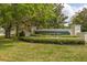 The Villas at Seven Dwarf Lane community entrance sign and landscaping at 2604 Lodi Cir # 103, Kissimmee, FL 34746