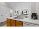 Bright kitchen view featuring a stainless steel sink and an open floor plan layout at 2604 Lodi Cir # 103, Kissimmee, FL 34746