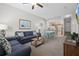 Open floor plan reveals a living room and adjacent dining area and kitchen at 2604 Lodi Cir # 103, Kissimmee, FL 34746