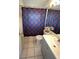 Bathroom with a shower and tub combination, a vanity with a white sink, and neutral tile floors at 2678 Autumn Creek Cir, Kissimmee, FL 34747
