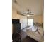 Comfortable bedroom with hardwood floors, a ceiling fan, and a window for natural light at 2678 Autumn Creek Cir, Kissimmee, FL 34747