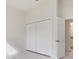 Bedroom featuring a closet and a door that gives access to the bathroom at 2776 Tropical Lake Dr, Kissimmee, FL 34741