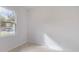 Bright, airy bedroom with natural light streaming through a large window at 2776 Tropical Lake Dr, Kissimmee, FL 34741