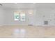 Bright open floorplan offers white walls, recessed lights and marble-look floors at 2776 Tropical Lake Dr, Kissimmee, FL 34741