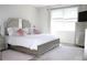 Bedroom with large window, carpet flooring and furniture at 2909 Theme St, Kissimmee, FL 34746