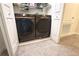 Convenient laundry room equipped with modern Samsung washer and dryer units at 2909 Theme St, Kissimmee, FL 34746