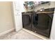 Convenient laundry room equipped with modern Samsung washer and dryer units at 2909 Theme St, Kissimmee, FL 34746