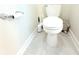 A clean white toilet in a well-maintained bathroom at 2909 Theme St, Kissimmee, FL 34746