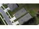 An overhead aerial view highlighting roof lines and street of homes at 30376 Armenia Rd, Leesburg, FL 34748