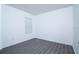An airy bedroom featuring luxury vinyl plank flooring and crisp, bright walls at 30376 Armenia Rd, Leesburg, FL 34748