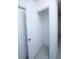 Walk-in closet with ample storage space and white doors at 30376 Armenia Rd, Leesburg, FL 34748