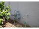 Exterior gas meter on the side of the house with green plants at 30376 Armenia Rd, Leesburg, FL 34748